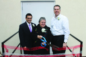 A ribbon-cutting ceremony was held for the new MRI unit at the Cherokee Indian Hospital on Thursday, Feb. 28.  Shown (left-right) are Casey Cooper, Cherokee Indian Hospital CEO; Carmaleta Monteith, CIHA governing board; and Brooks Robinson, Harrah’s Cherokee senior vice president and general manager.  (SCOTT MCKIE B.P./One Feather)