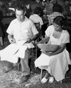 Here, Johnson Catolster and daughter Sarah demonstrate at the Craftsman’s Fair of the Southern Highlands in 1949. (Photo courtesy of the Southern Highland Craft Guild)