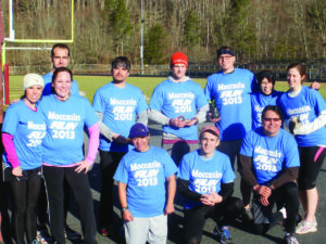 Participants in the 2nd Annual Moccasin Run are (left-right) back row – Todd Burkhalter; middle row – Angel Squirrel, Dawna Paul, Jimmy Oocumma, John Vogler, Seth Holling, Robin Swimmer and Katie Ross; front row – Skye Littledave, Charlie Myers and Stephen Swimmer.  (Photo courtesy of Gerri Grady) 