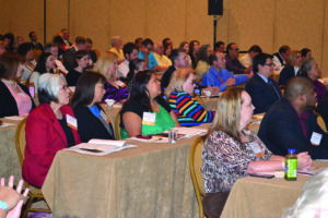 Employees with the Eastern Band of Cherokee Indians Finance Division are shown at the NAFOA conference.  Shown (left-right) back row – Gerry Grady, purchasing manager; Amy Kalonaheskie, revenue and taxation manager; Cindy Chandler, investment analyst; Cory Blankenship, treasury director; front row – Angie Votaw, budget manager; and DeMakus Staton, grants and contract supervisor.  