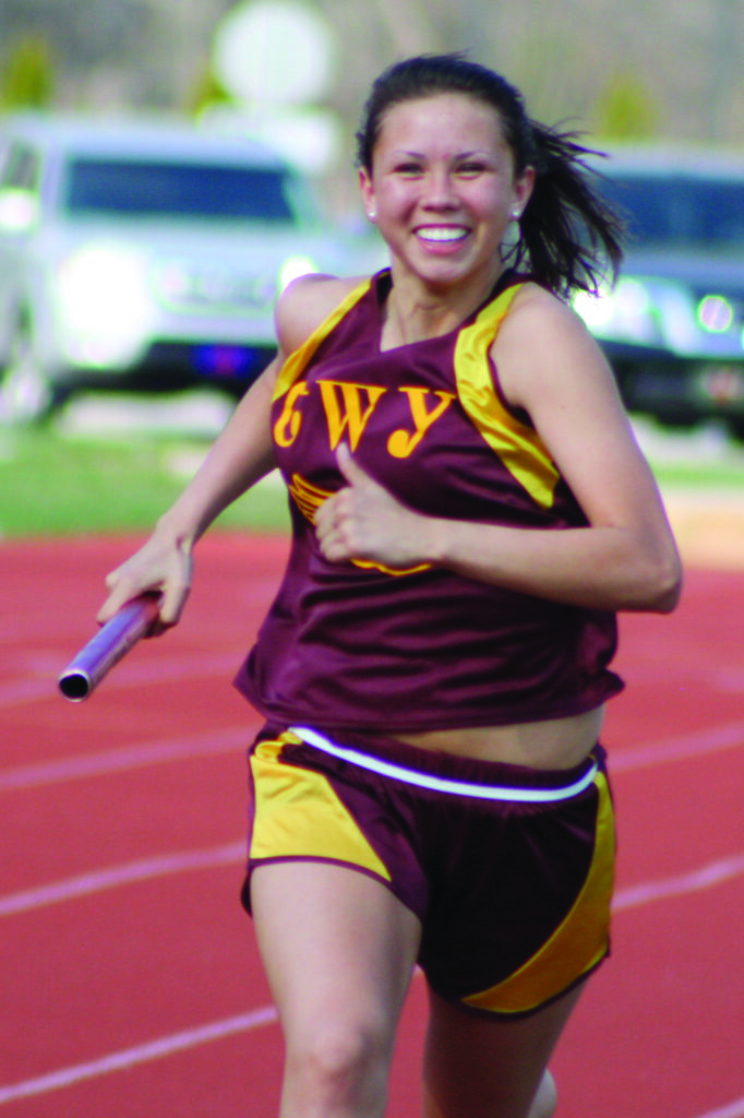 Cherokee’s Kendall Toineeta is all smiles as she run to victory in the girls 800M run.  She won the race with a time of 2:38.  