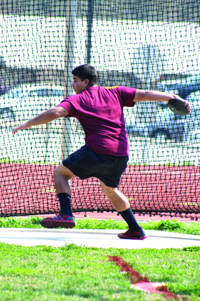 Cherokee’s Justice Littlejohn throws the discus during a four-school track meet held at Cherokee High School on Wednesday, April 10.  He took fifth place with a throw of 87’ 3”.  (DENISE WALKINGSTICK/One Feather contributor photos)