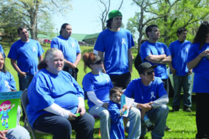 Members of the Littlejohn family, including Aubrey’s mother, Jasmine Littlejohn (seated right), are shown at the conclusion of Thursday’s walk.  