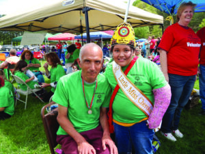 Little Miss Cherokee Marcela Garcia (right) visits with Tony Wolfe, Qualla Boundary Special Olympics team, at the Far West Special Olympics Spring Games on Friday, May 3.  (Photos courtesy of Melissa Garcia) 