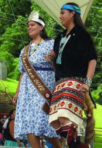 Miss Cherokee dances with a member of the Turquoise Dancers, a Navajo dance group, during the Festival of Native Peoples in Cherokee.  
