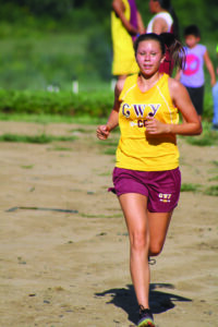 Cherokee’s Kendall Toineeta runs en route to a fifth place finish at the Swain County Invitational held Wednesday, Sept. 4.  (DENISE WALKINGSTICK/One Feather contributor) 
