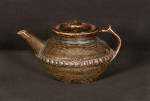 The first piece purchased by Western Carolina University art professor Joan Byrd, a teapot by the English artist Michael Cardew, will be among the works exhibited in a show opening Monday, Feb. 17, at WCU.  (Photos by Ashley T. Evans/WCU) 