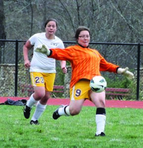 Cherokee goalkeeper Anna Cline punts the ball following a save in the first half.  On the game, she had over 10 saves.  