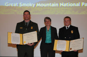 DOI Secretary Sally Jewell presents awards to Park Ranger Brad Griest and Firefighter Chris Scarbrough.  (NPS photo) 