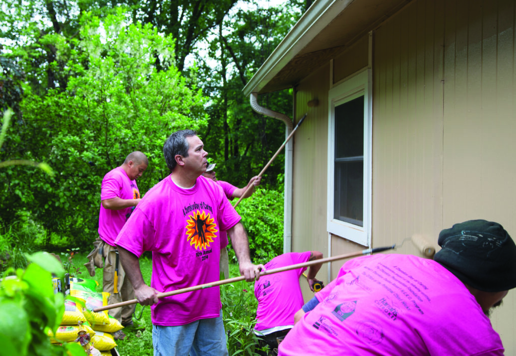 Lumpy Lambert (center), general manager of Harrah’s Cherokee Valley River Casino & Hotel, was one of 225 volunteers for the 10th Annual Cherokee Day of Caring on Thursday, May 15.  (Photos by Kristy Herron/EBCI Commerce) 