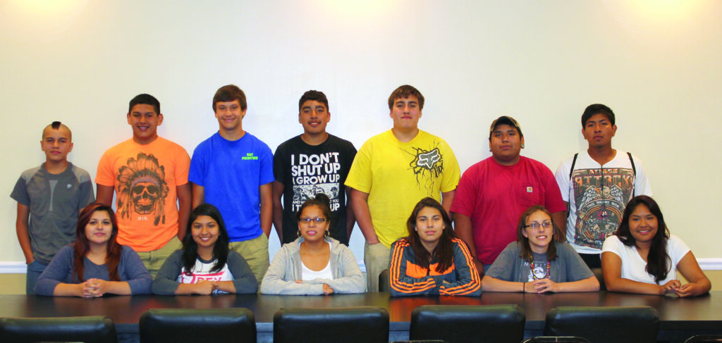 Shown (left-right) are the Cherokee Boys Club’s OJT students for 2014:  front row - Larissa Martinez, Tierra Martinez, Kaycee Lossiah, Lucy Reed, Anna Mintz and Sunshine Grant; back row - Kevin Jackson Jr., Kennan Panther, Steven Straughan, Jeff Girty Jr., Jarren Girty, Cory Hill and Jared Panther. (CBC photo) 