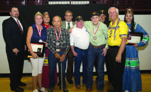 (L to R) Representative of U.S. Rep. Markwayne Mullin’s office Sgt. William Barnes, Cherokee National Medal of Patriotism honoree Cooie Meigs’ daughter Autumn Meigs Smith, Jr. Miss Cherokee Chelbie Turtle, Cherokee National Medal of Patriotism honoree Joseph Fourkiller, Cherokee Nation Deputy Chief S. Joe Crittenden, Cherokee National Medal of Patriotism honoree Kenneth Morris’ son-in-law Robert Hopper, Cherokee National Medal of Patriotism honoree Kenneth Morris, Cherokee National Medal of Patriotism honoree Kenneth Morris’ stepson Brad Guffey, Principal Chief Bill John Baker and Miss Cherokee Sunday Plumb. Not pictured: Cherokee National Medal of Patriotism honoree Robert Whisenhunt.