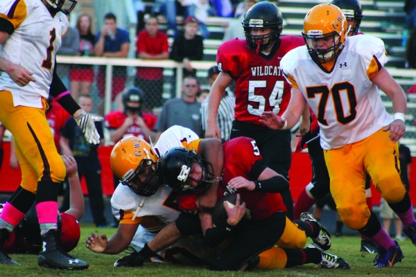 Zak Perez (#52) pummels an Andrews running back.  Cherokee’s defense held strong all game long holding the Wildcats to only 16 points.  