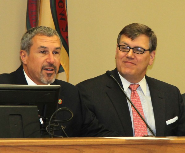 Cherokee Chief Justice Bill Boyum (left) speaks as the Cherokee Tribal Court opens a session of CVB Court, the first one ever in Indian Country, on Thursday, April 2 as Chief U.S. District Court Judge Frank Whitney looks on.  (SCOTT MCKIE B.P./One Feather photos) 
