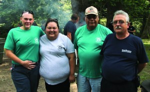 A cookout was hosted by the Cherokee Burned Children’s Fund for participants in Camp Amigo on the Oconaluftee Island Park.  Shown (left-right) are: Concheta DeHart, CBCF president; Kitty Taylor, CBCF vice president; Mernie Taylor, retired Cherokee firefighter; and Curtis Arneach, Cherokee Fire Department Chief.  