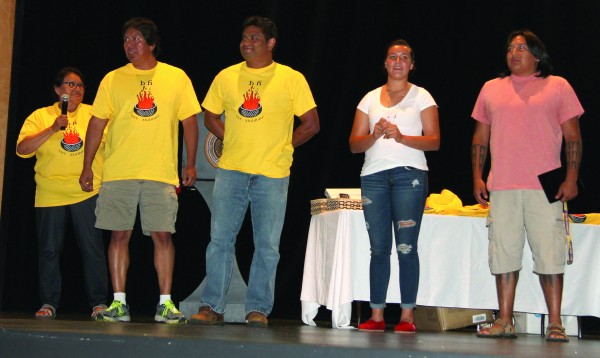 Laura Pinnix (left) introduces four EBCI tribal members whose voices were used in the new Shi-yo Cherokee language app during an unveiling celebration for the app on Thursday, June 4.  Shown (left-right) are Pinnix, Garfield Long Jr., Bo Lossiah, Dre Crowe, and Micah Swimmer.   (SCOTT MCKIE B.P./One Feather) 