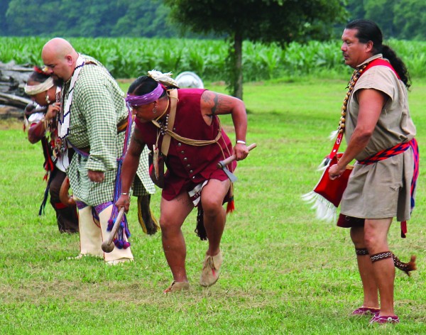 The Warriors of Anikituwah, shown at last year’s Kituwah Celebration, raised and donated $511 recently to the new Cherokee Children’s Home.  Shown (left-right) are Sonny Ledford, John Grant Jr., Will Tushka and Daniel Tramper.  (SCOTT MCKIE B.P./One Feather) 