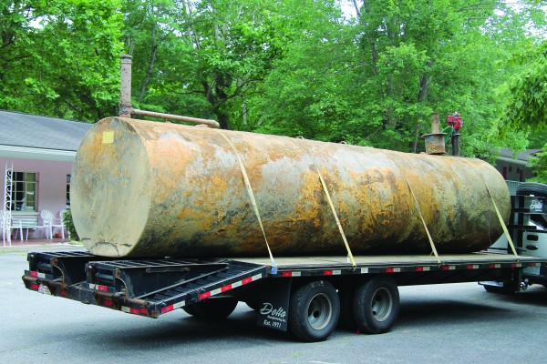 One of the tanks removed from the site sits on a flatbed truck.  It was later hauled to a scrapyard in Asheville. 