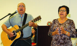 Alfred Welch, Distinguished Citizen Award recipient, is shown singing with his wife, Maybelle, at Wednesday’s event.  (SCOTT MCKIE B.P./One Feather photos) 