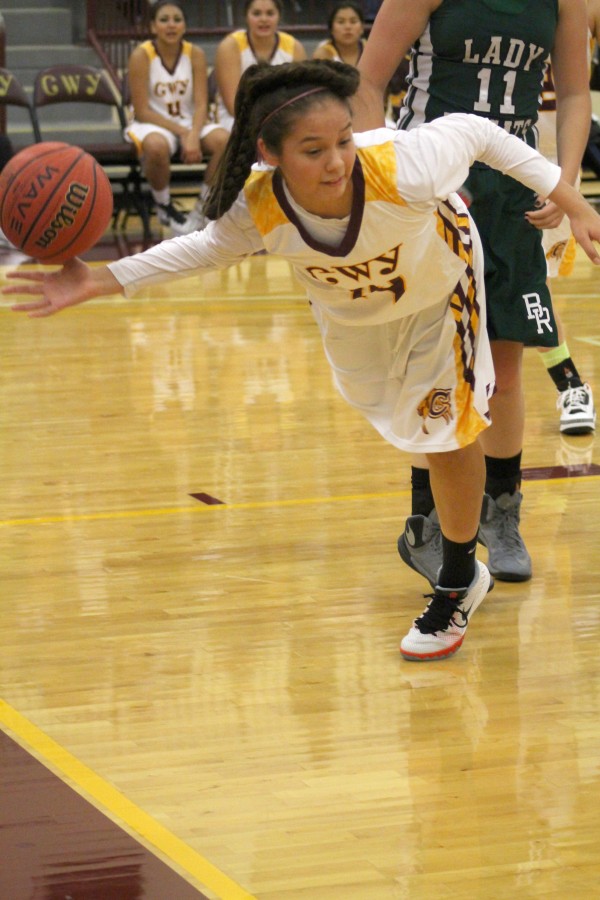 Cherokee’s Shelby Wolfe (#14) hustles to save a ball going out-of-bounds.  On the night, she had 5 points.  