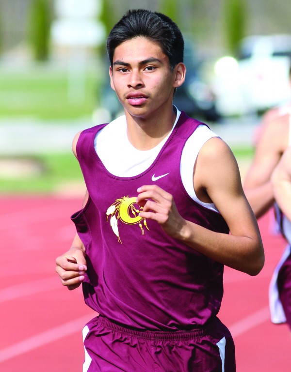 Darius Lambert, Braves freshman, takes the lead in the 1600M Run, an event he would go on to win with a time of 5:05.0 He also took first in the 800M Run with a time of 2:21.0. 