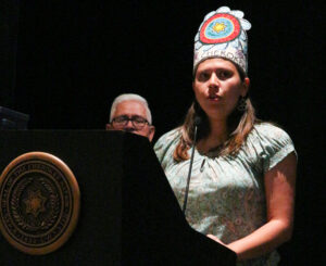 Miss Cherokee sings the Cherokee National Anthem to open the CHS Athletic Banquet on May 24.  (SCOTT MCKIE B.P./One Feather) 
