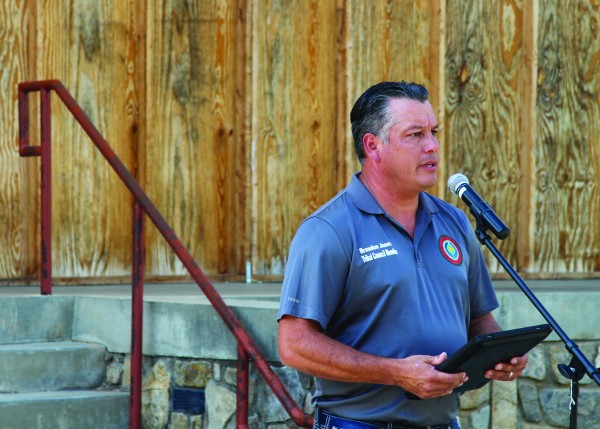 Tribal Council Vice Chairman Brandon Jones tells his own personal story of past addictions at the Rally for Recovery held at the Cherokee Indian Fairgrounds on Tuesday, Sept. 13. (SCOTT MCKIE B.P./One Feather photos) 