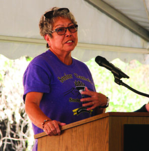 PROUD EFFORT: Jody Taylor, an EBCI elder from the Birdtown Community, speaks during Wednesday’s event. She submitted legislation to Tribal Council three years ago that led to the Center being built. 