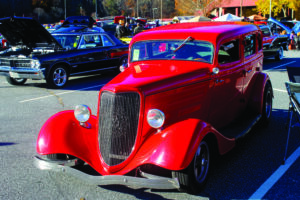 This candy apple red 1934 Studebaker, belonging to Richard and Lisa Harmon from Knoxville, Tenn., shines in the sun during a previous Fall Rod Run.  (SCOTT MCKIE B.P./One Feather) 