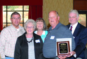 25 YEARS: Towstring members are shown being presented the President’s 25th Award (left to right) Big Cove Rep. Richard French,Jan Crutchfield, Rachel Mathis, Ancil Crutchfield and LT Ward, vice president of WNC Communities. 
