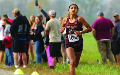 RUNNING: Swimmer commits to D1 program for cross country, track and field