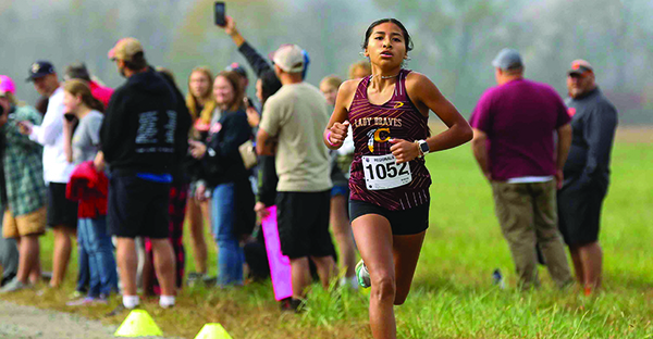 RUNNING: Swimmer commits to D1 program for cross country, track and field