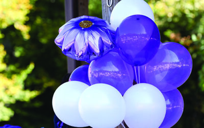 Rising from the darkness: EBCI hosts Purple Lotus Day event